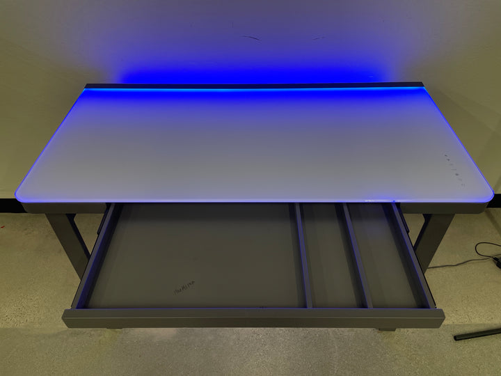 Tresanti Aurora 47” Adjustable Height Desk with LED Lighting (chip on edge of glass top)